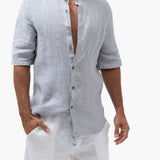 Mandarin collar short sleeve shirt.